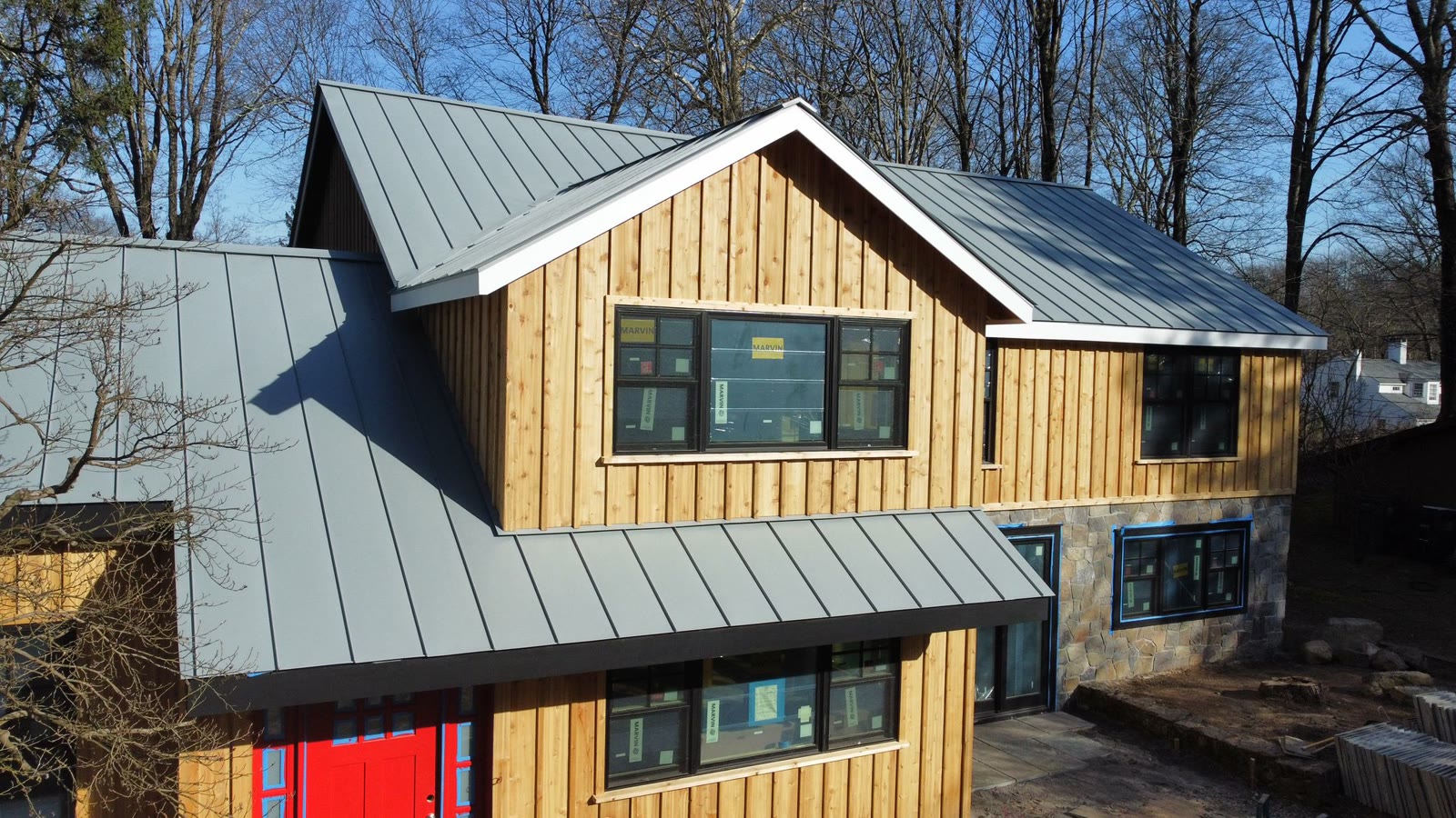 Techo de Metal y Siding de Madera